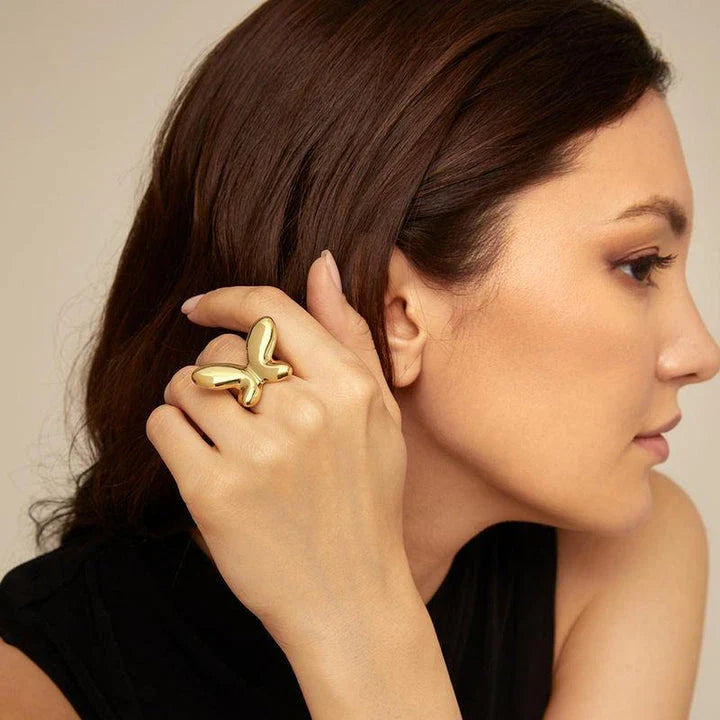 Trendha 18K gold-plated stainless steel butterfly ring, a durable and elegant accessory for UK special occasions