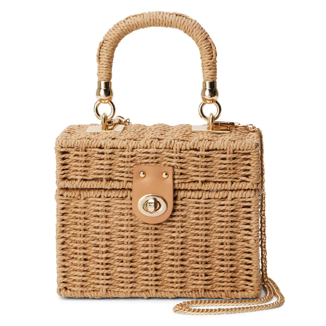 Handcrafted natural straw beach bag with bohemian-inspired design and detachable metal chain strap