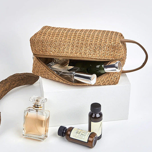 Elegant straw cosmetic bag with unique knitting pattern, perfect for organising beauty essentials