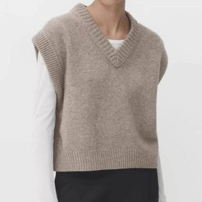 Chic Autumn/Winter Women's Soft Knitted V-Neck Vest in a classic solid colour, featuring a cosy turtleneck collar and sleeveless design for easy layering.