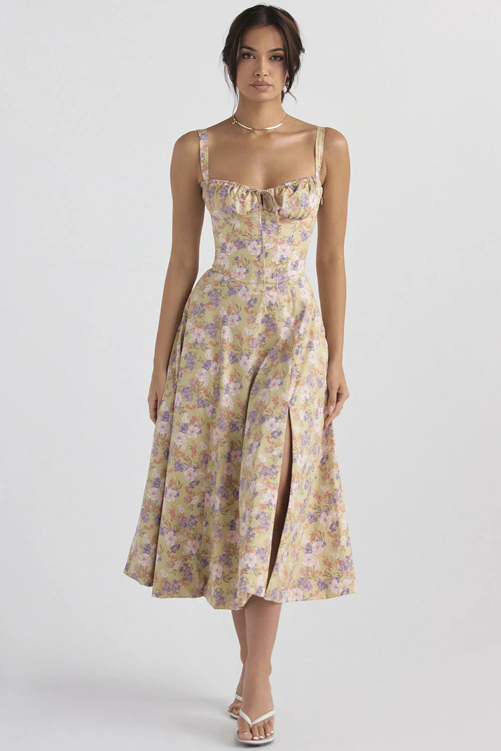 A stylish suspender dress made of premium polyester with a French high-split design, available in a range of vibrant solid colours for versatile summer wear.