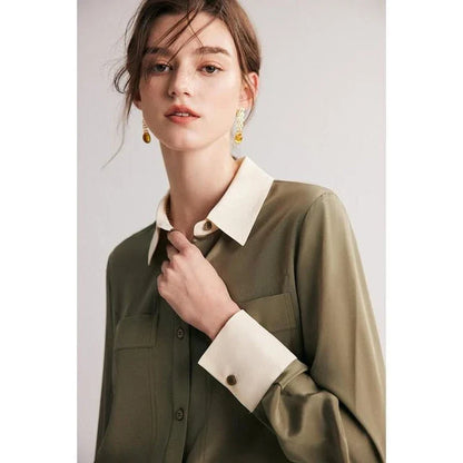 A chic and elegant silk crepe de chine blouse in a timeless solid pattern, perfect for professional and casual wear.