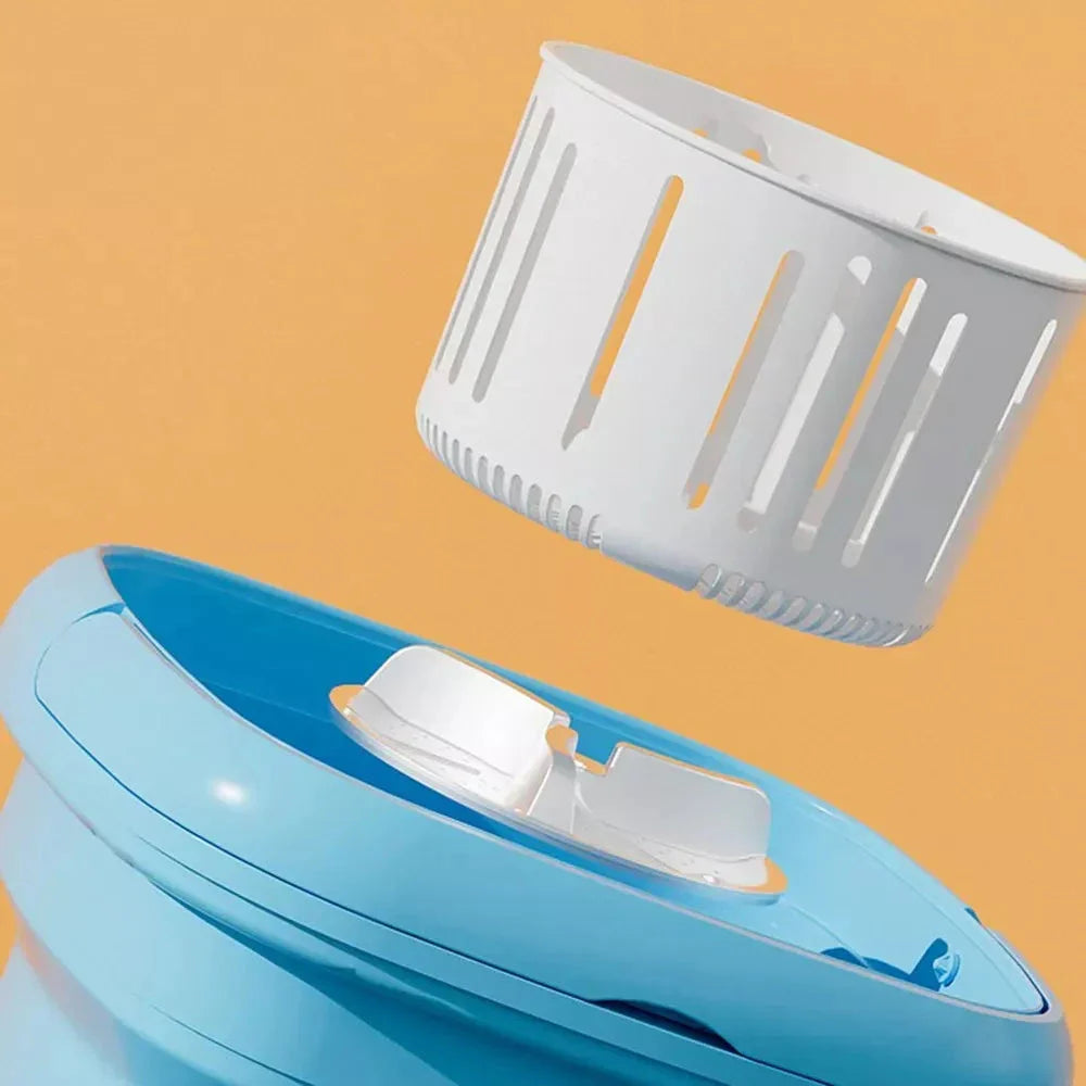 Compact and portable mini automatic washing machine with a sleek, space-saving design for small living spaces