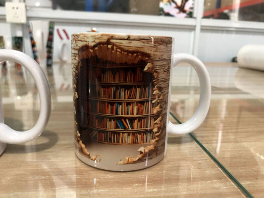 Charming 3D Bookshelf Mug - A unique ceramic coffee or tea cup with a detailed bookshelf design, perfect for book lovers in the UK
