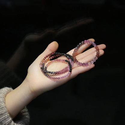A close-up view of a ladies' fashion bracelet featuring a single loop design with sparkling crystal beads
