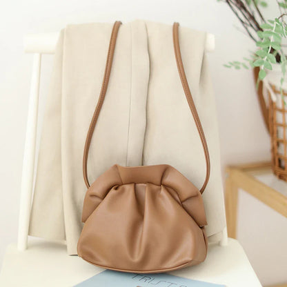 Chic retro dumpling bag made with soft, premium PU material in a one-shoulder diagonal design
