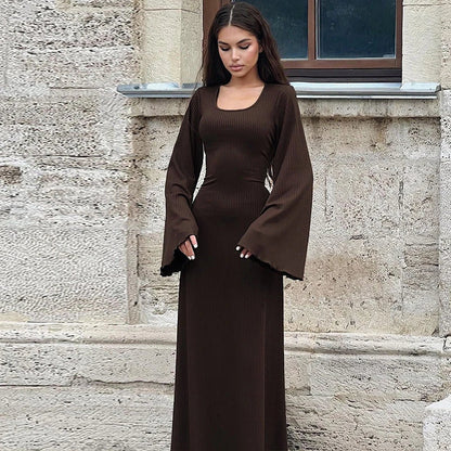 Elegant U-neck dress with lace-up back and flowing bell sleeves in a variety of sophisticated colours