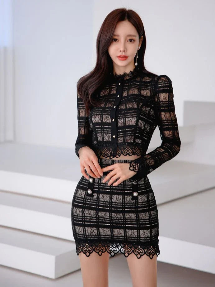 Elegant lace-trimmed two-piece suit with Chanel-inspired design and tailored stitching details
