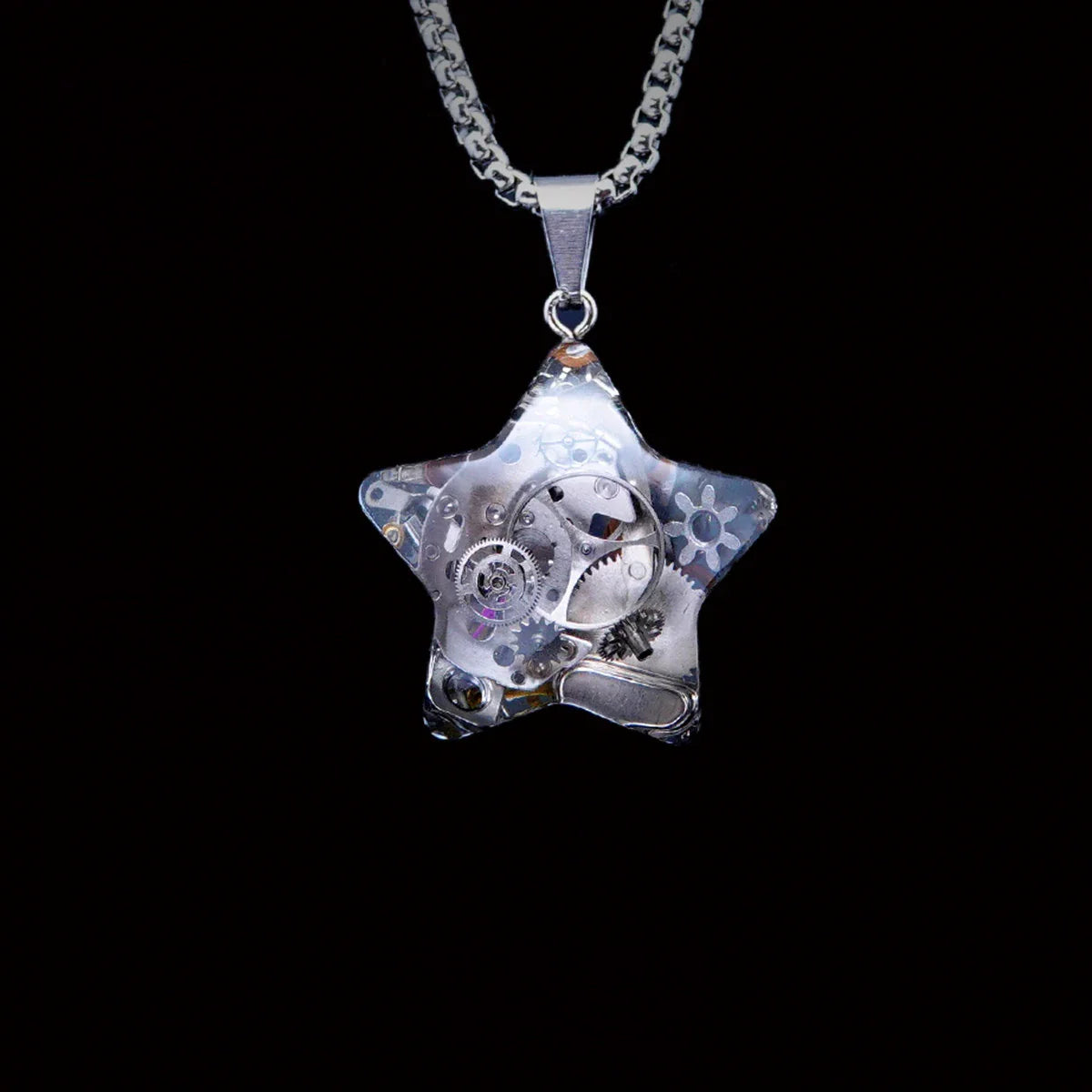 Elegant titanium steel star and moon pendant necklace with a mesmerizing cosmic-inspired design