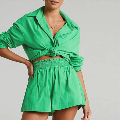 Chic high-waist cotton linen shirt and shorts set in pink, featuring a turn-down collar, long sleeves, and a relaxed, flattering fit for the modern British woman.