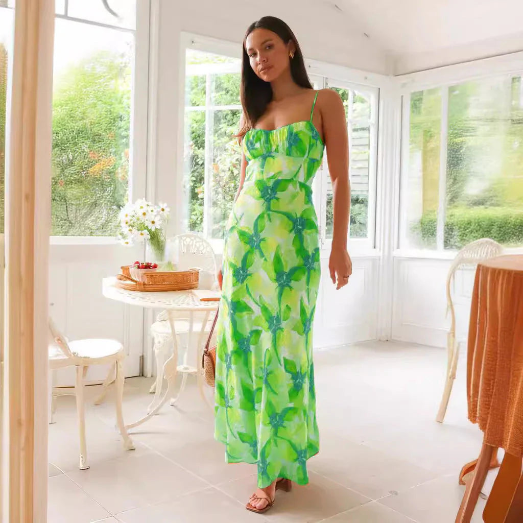 Elegant floral midi dress with backless design, available in yellow, purple, and green colours