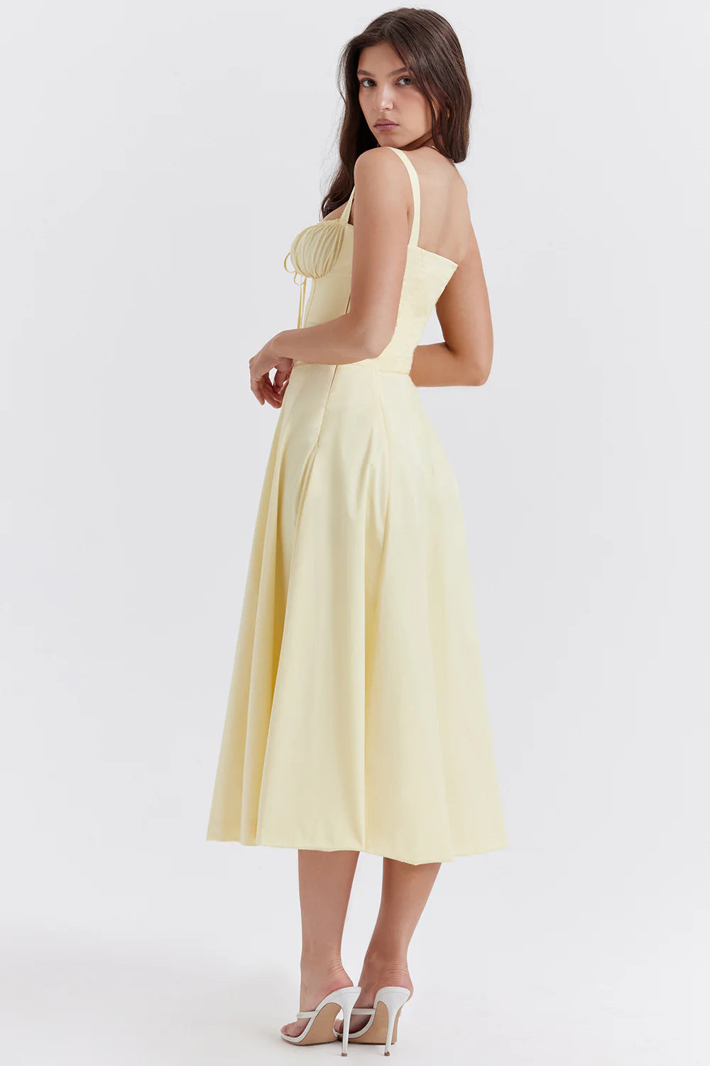 A stylish suspender dress made of premium polyester with a French high-split design, available in a range of vibrant solid colours for versatile summer wear.