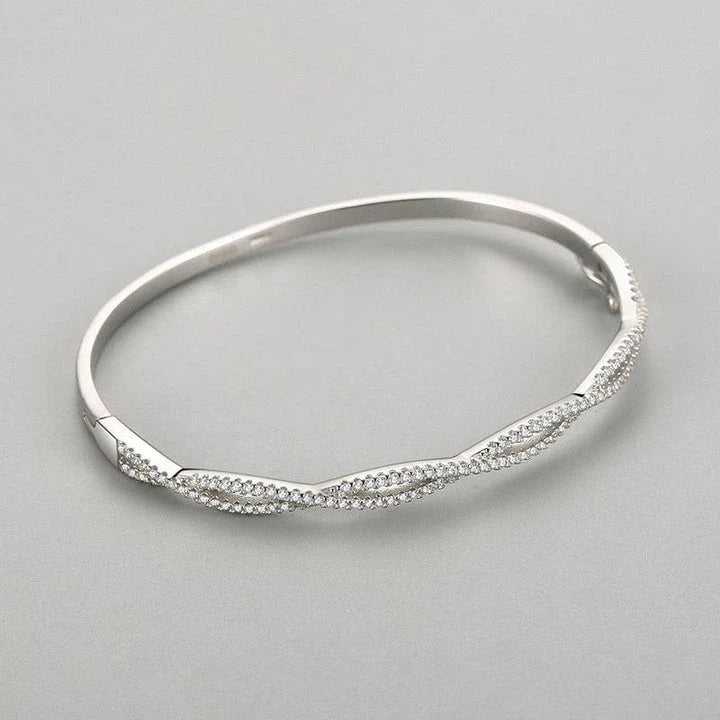 Silver bracelet with wave pattern, ideal for fashion-conscious women in the UK
