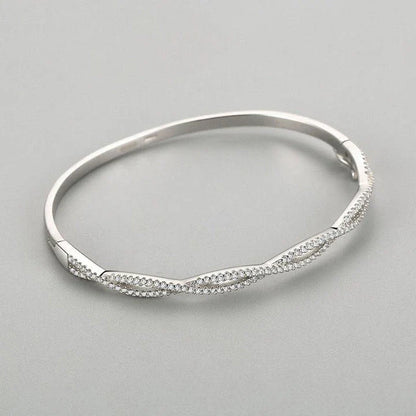 Silver bracelet with wave pattern, ideal for fashion-conscious women in the UK