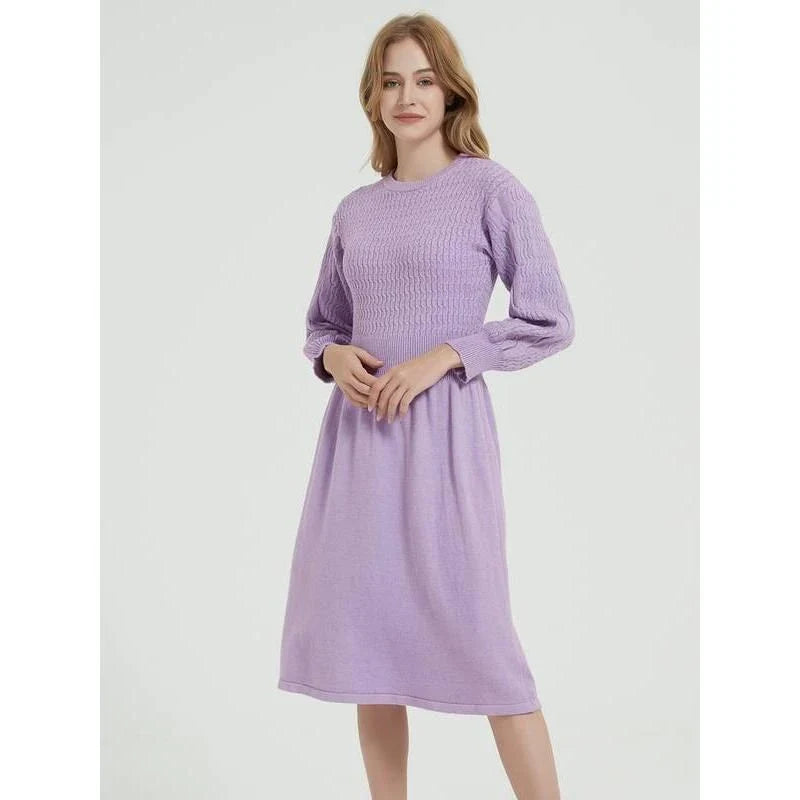 Elegant long sleeve knitted sweater dress in red with a classic A-line silhouette and mid-calf length