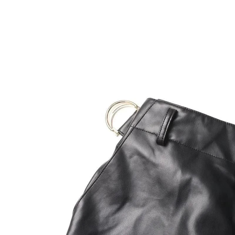 A pair of high-waist leather cargo pants with a stylish patchwork design, offering a blend of functionality and fashion for modern women.