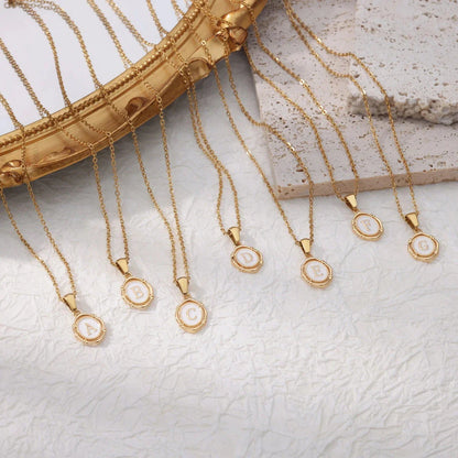 Elegant gold-tone letter pendant necklace with innovative drip oil design and integrated fitness tracker