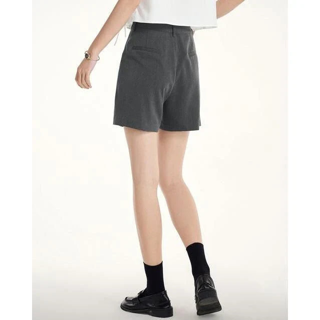 Elegant, high-waist harem shorts for women in the UK, featuring a relaxed, flowing silhouette and practical details for comfortable, stylish summer wear.