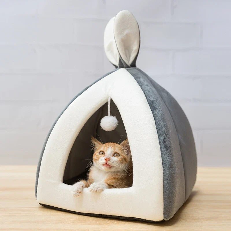 A cosy and stylish cat house villa bed made with premium materials, providing a comfortable retreat for your feline friend.