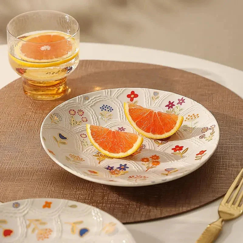 Elegant floral ceramic plate with intricate underglaze pattern, perfect for serving breakfast, lunch, dinner or desserts