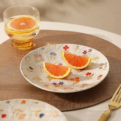 Elegant floral ceramic plate with intricate underglaze pattern, perfect for serving breakfast, lunch, dinner or desserts