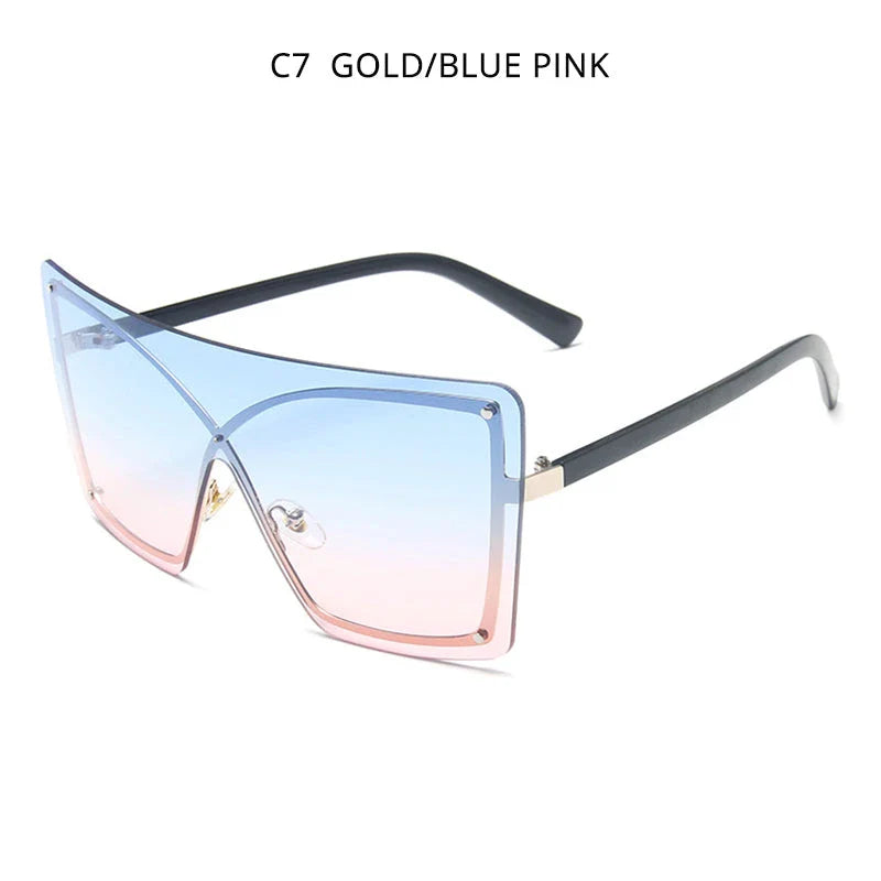 Stylish oversized flat top sunglasses with a rimless design, providing UV protection and a comfortable fit for the modern British woman