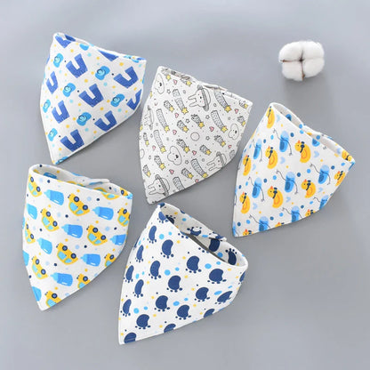A set of fashionable cotton baby bandana bibs in various prints and colours, designed to keep your little one dry and stylish.