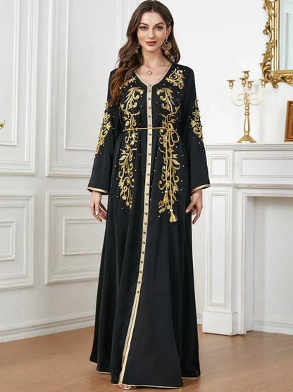 A sophisticated long-sleeve women's dress with a captivating floral embroidery pattern and a refined colour palette, suitable for a variety of occasions.