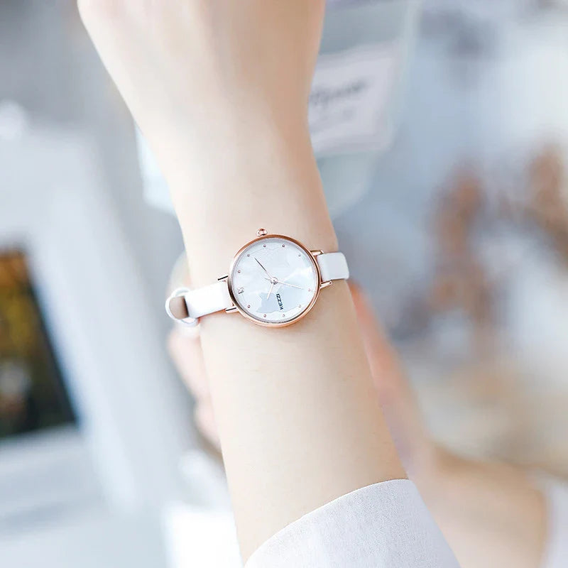 Elegant luxury women's watch with a sleek, minimalist design and a premium PU leather strap