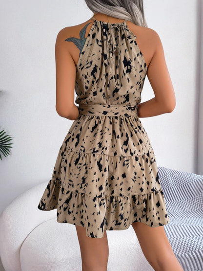 Chic leopard print swing dress in various colours, perfect for summer fashion and beach outings.