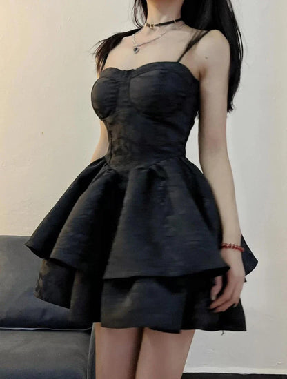 A stylish and elegant women's pettiskirt in a classic black colour, featuring a flowing A-line silhouette and premium polyester construction.