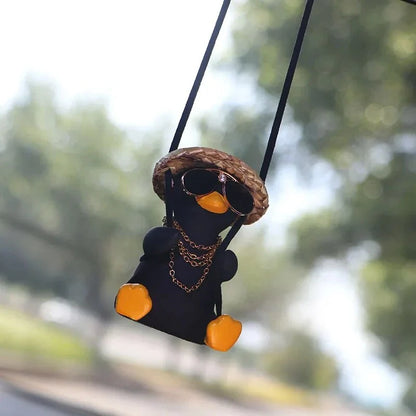 Charming swinging duck car accessory with guitar and coke-themed design, offering a unique and personalized driving experience