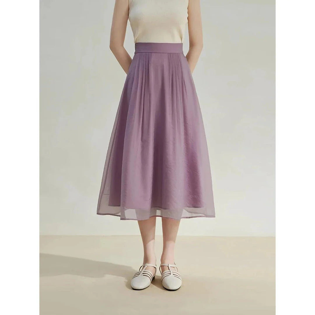 Elegant high-waist a-line midi skirt in a solid, vibrant colour for professional and social wear