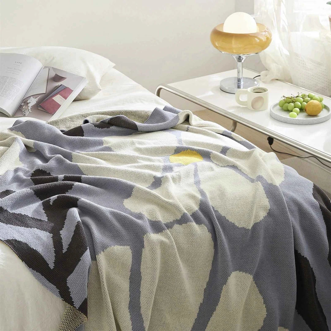 Pastoral Floral Leaves Cotton Throw Blanket in various colours, featuring a nature-inspired design for cosy home decor