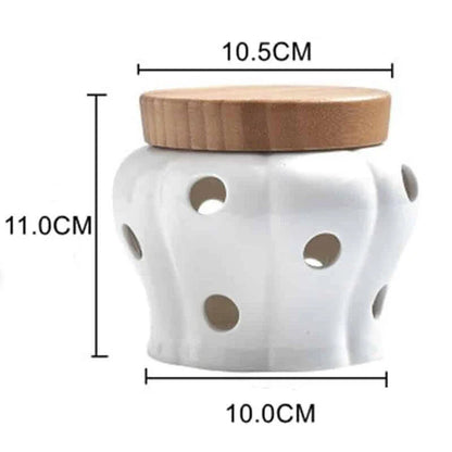 Ceramic and wood garlic storage jar with airtight design and stylish appearance for modern British kitchens