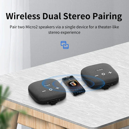 Portable Bluetooth speaker with powerful bass, IP67 waterproof rating, built-in power bank, and 12-hour battery life