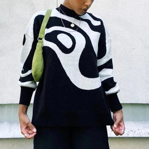 Chic striped turtleneck oversized jumper for women in black colour, featuring a relaxed fit and stylish pattern