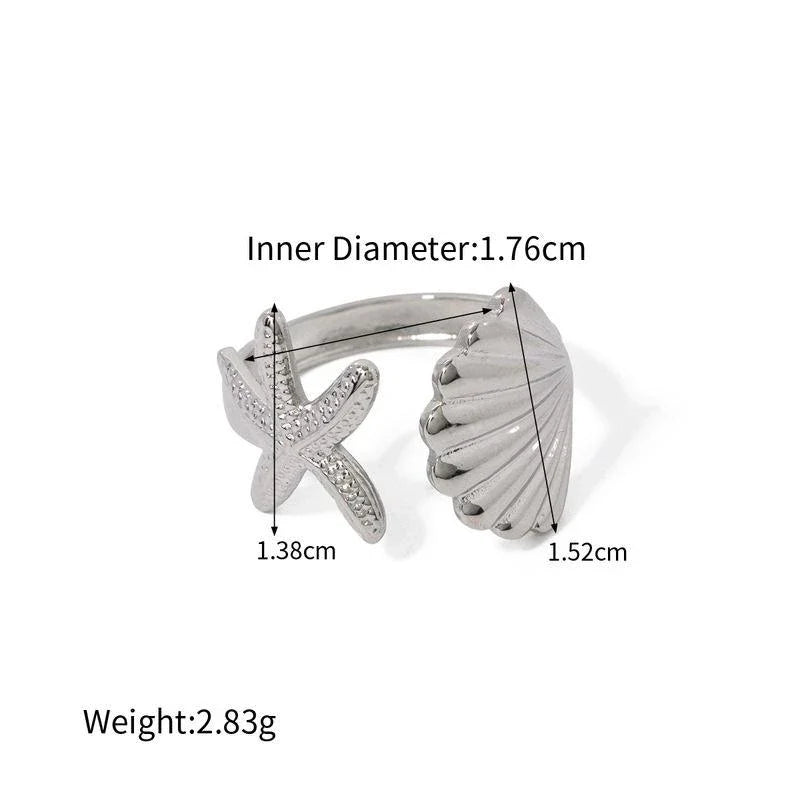 Adjustable stainless steel ring with starfish and shell accents, perfect for beach and casual wear