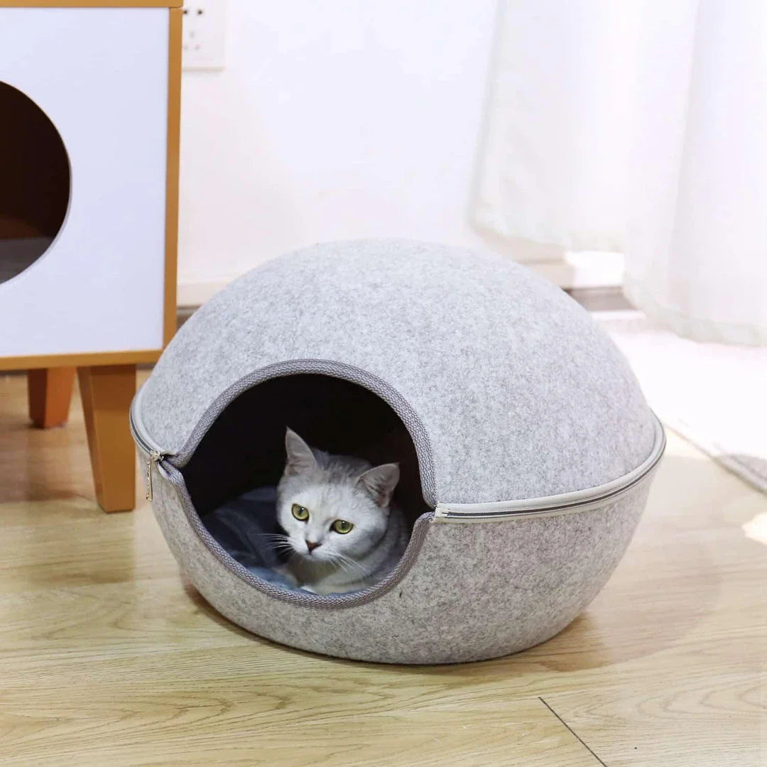 Cosy and comfortable egg-shaped pet bed with plush, supportive padding for your furry friend's relaxation