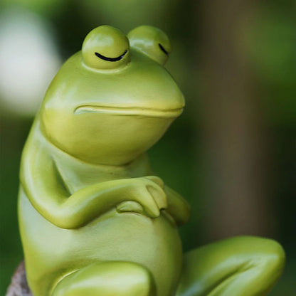 Charming resin figurine of a thoughtful, contemplative frog in a realistic pose, perfect for home or garden decor