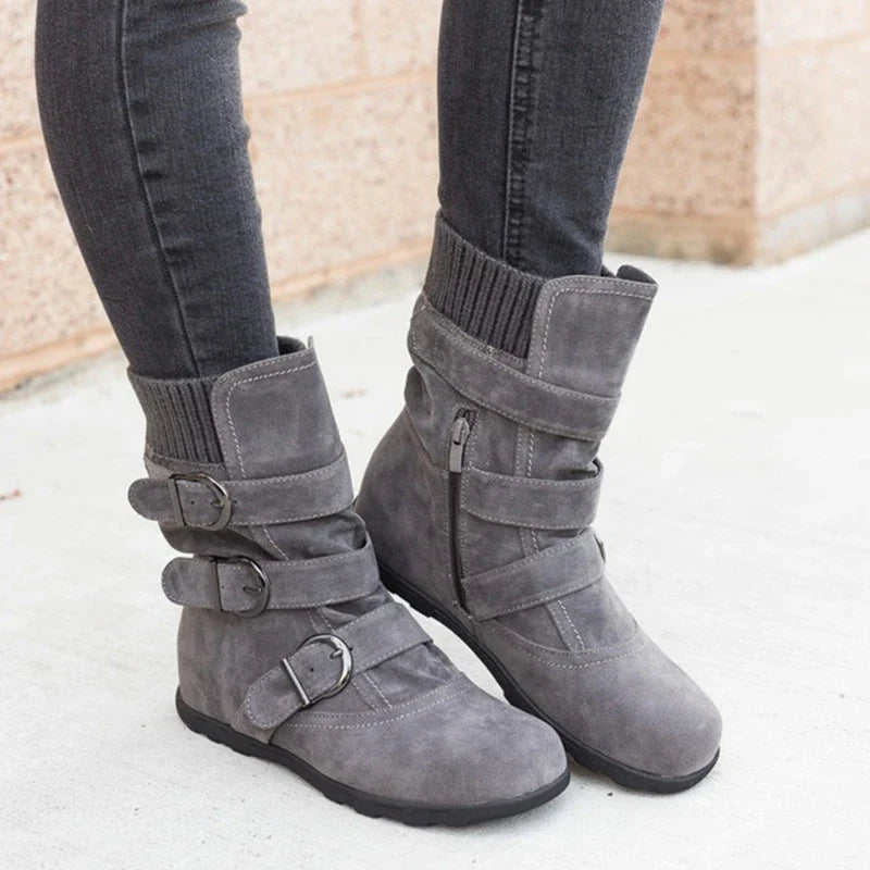 Durable cotton boots with resilient rubber soles, stylish car-stitch detailing, and cushioned artificial hair insole for all-day comfort.