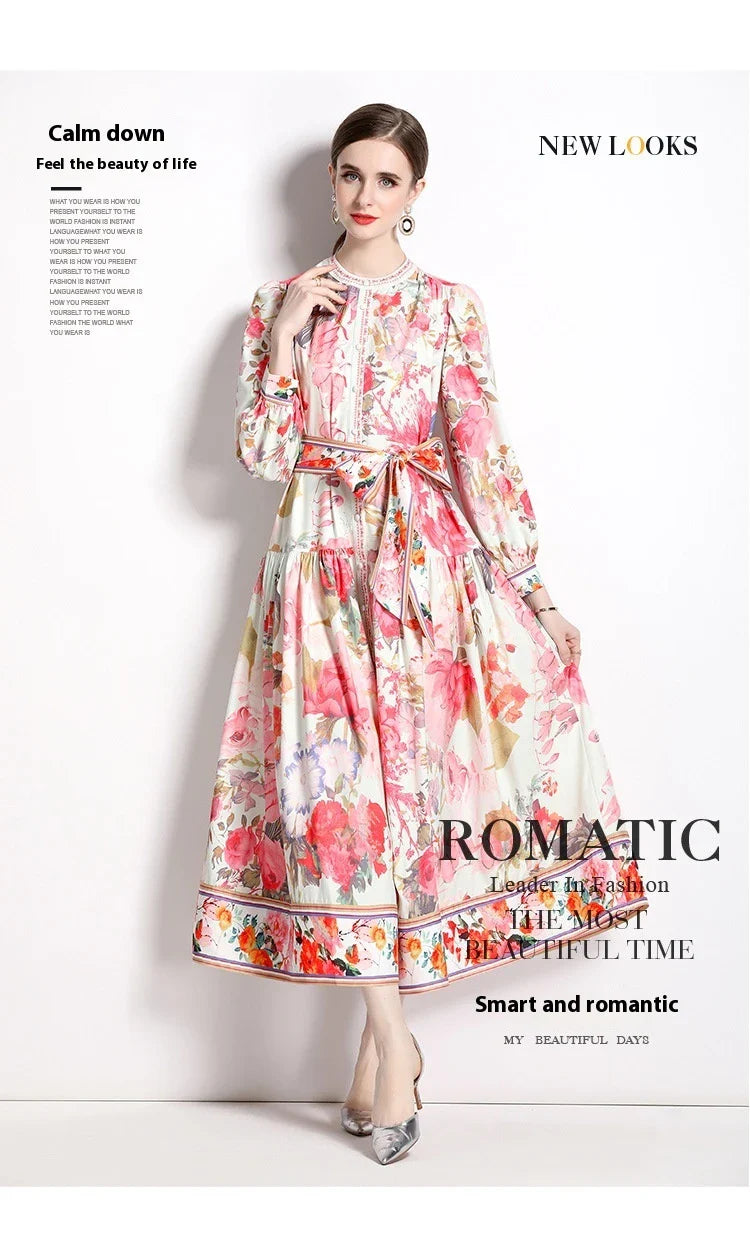Elegant floral single-breasted swing dress with delicate print, tailored design, and flowing silhouette