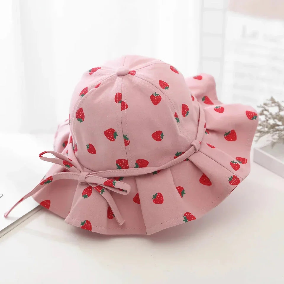 Adjustable cotton sun protection bucket hats for children with whimsical cartoon designs