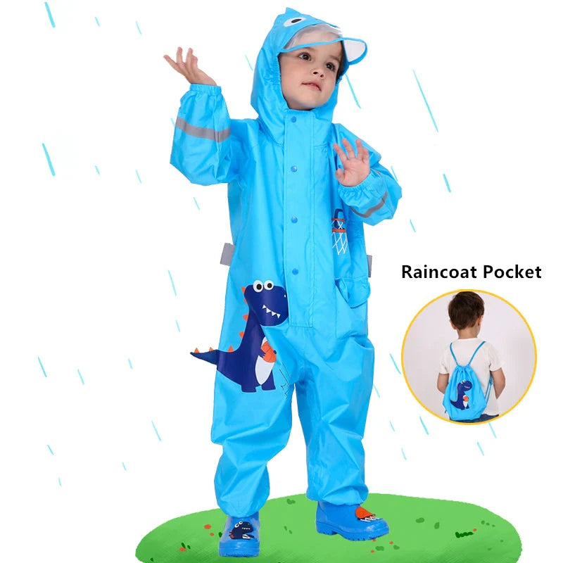 Children wearing a vibrant, dinosaur-themed waterproof rain jumpsuit playing outdoors in the rain