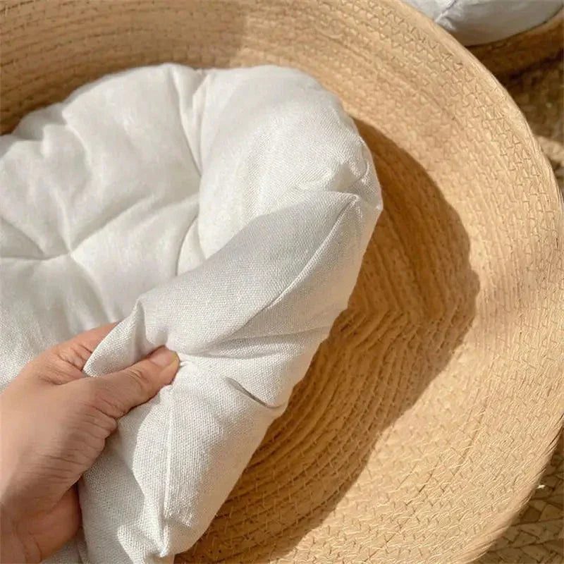 Handmade bamboo pet bed with removable cushion, designed for cosy relaxation of cats and small dogs