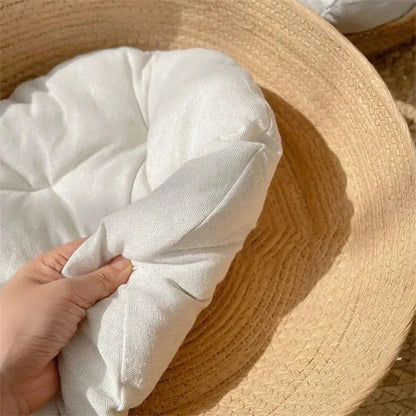 Handmade bamboo pet bed with removable cushion, designed for cosy relaxation of cats and small dogs