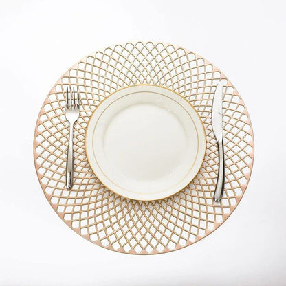 Elegant floral-patterned PVC dining table coaster in a contemporary setting, protecting a wooden table surface