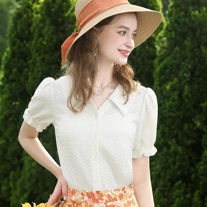 Elegant apricot French-inspired lace blouse with puff sleeves and v-neck collar, perfect for the modern British woman
