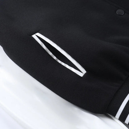 A classic British-style baseball jacket with contrast PU stitching, showcasing a sophisticated and versatile design for casual wear.