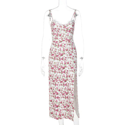 Elegant floral midi dress with slit, adjustable suspender straps, and luxurious polyester fabric for a sophisticated summer look.